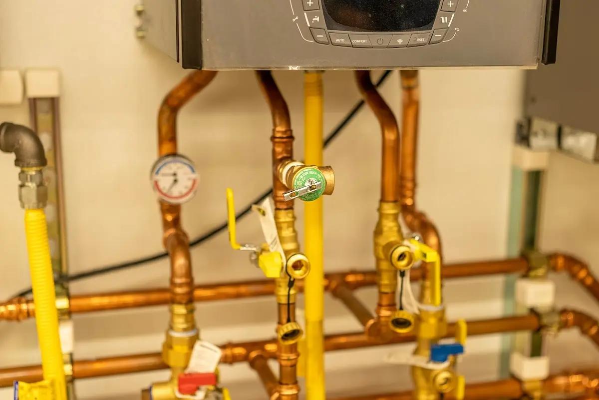 Licensed technician providing Water Heater Installation for a homeowner in Denison